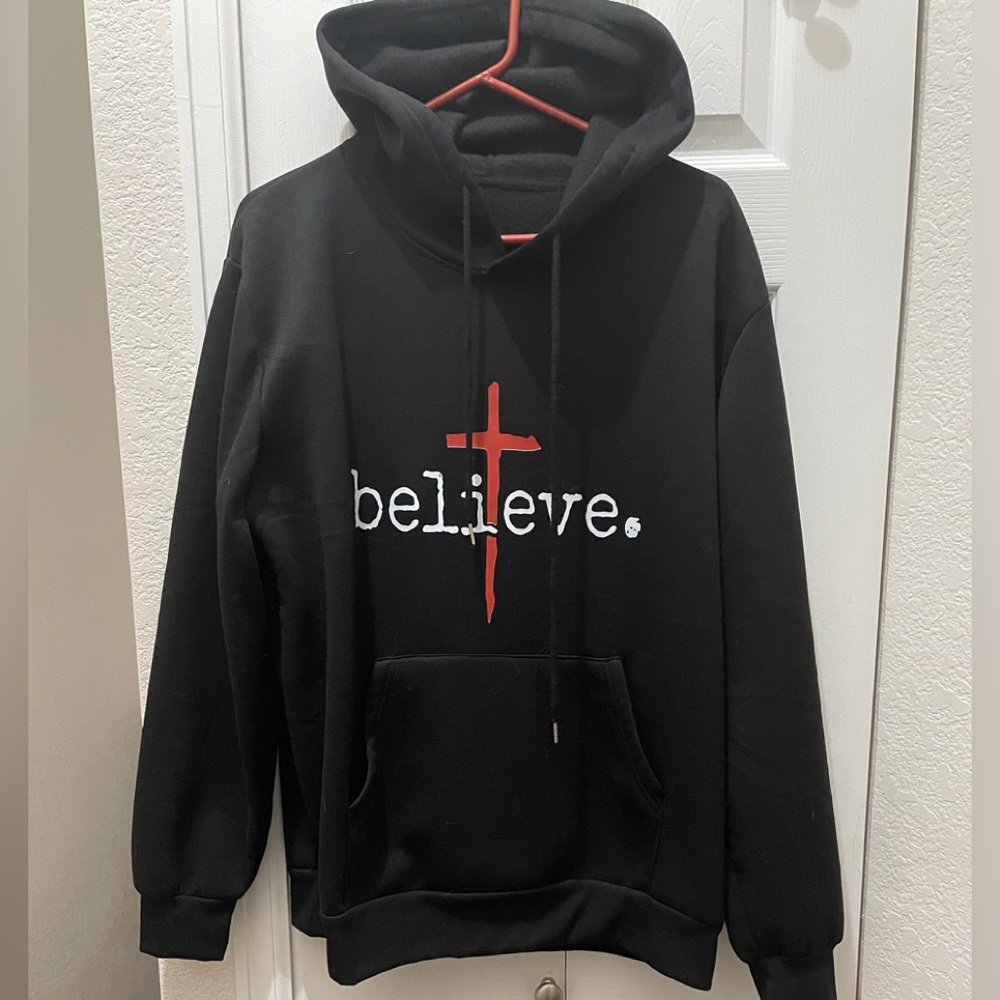 Black Hoodie with Red and White Believe Graphic